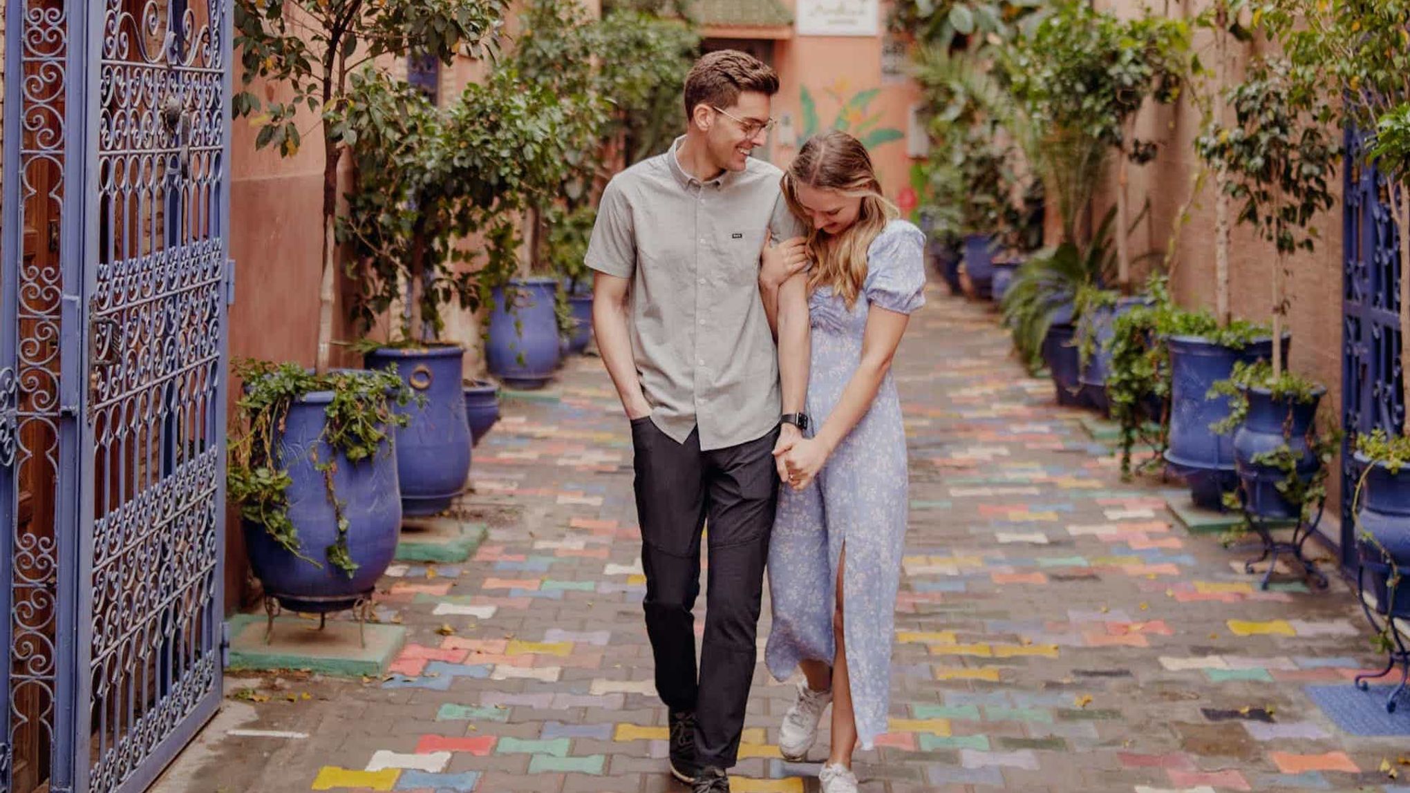 Grant and Leah holding hands in Morocco